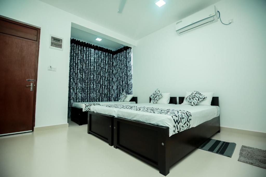 Postel nebo postele na pokoji v ubytování RoaBaa Guesthouse