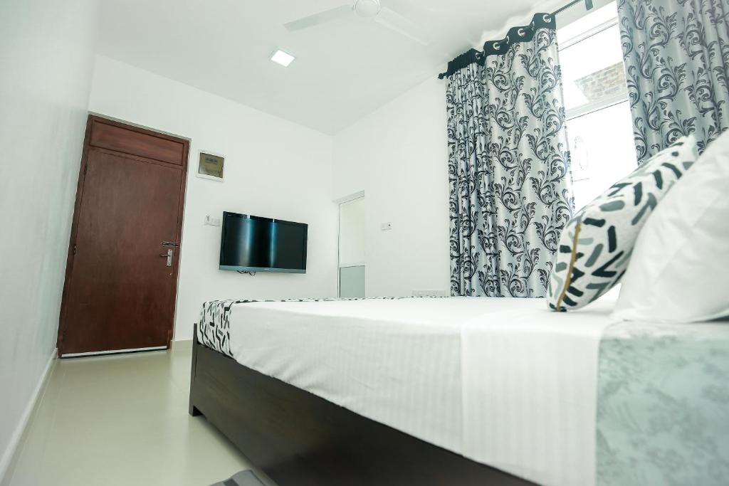 Postel nebo postele na pokoji v ubytování RoaBaa Guesthouse