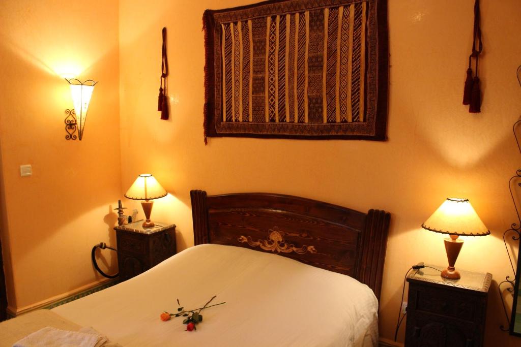 Letto o letti in una camera di Riad Salmiya Dune