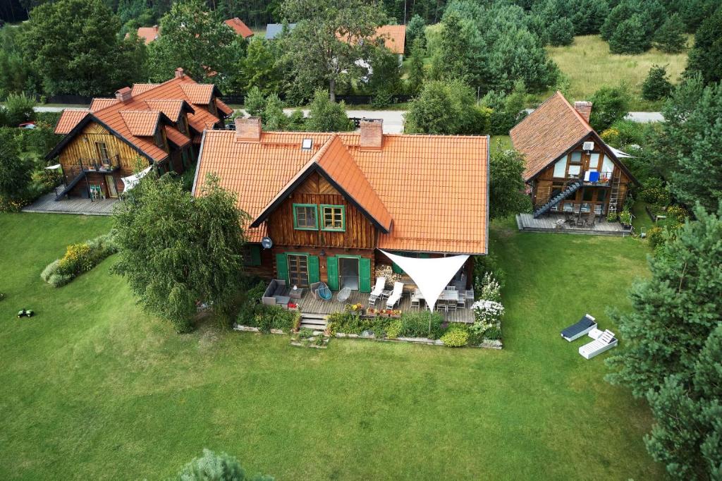 Vonkajšia záhrada v ubytovaní Gosciniec Szuwary
