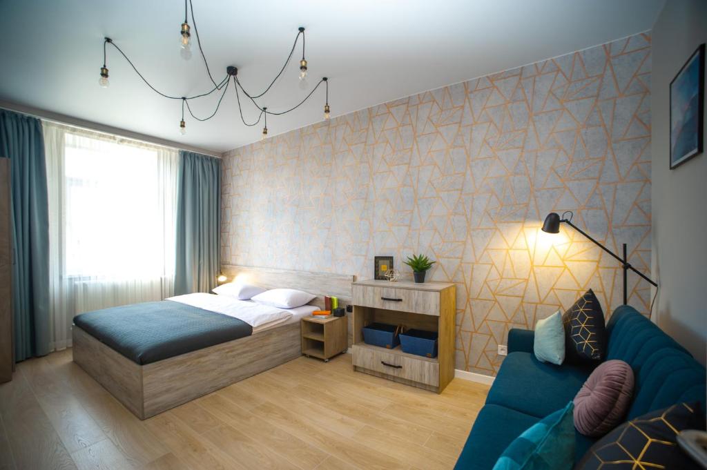 Posteľ alebo postele v izbe v ubytovaní 3 bedroom, 2 bathroom Apartment near Forum Lviv