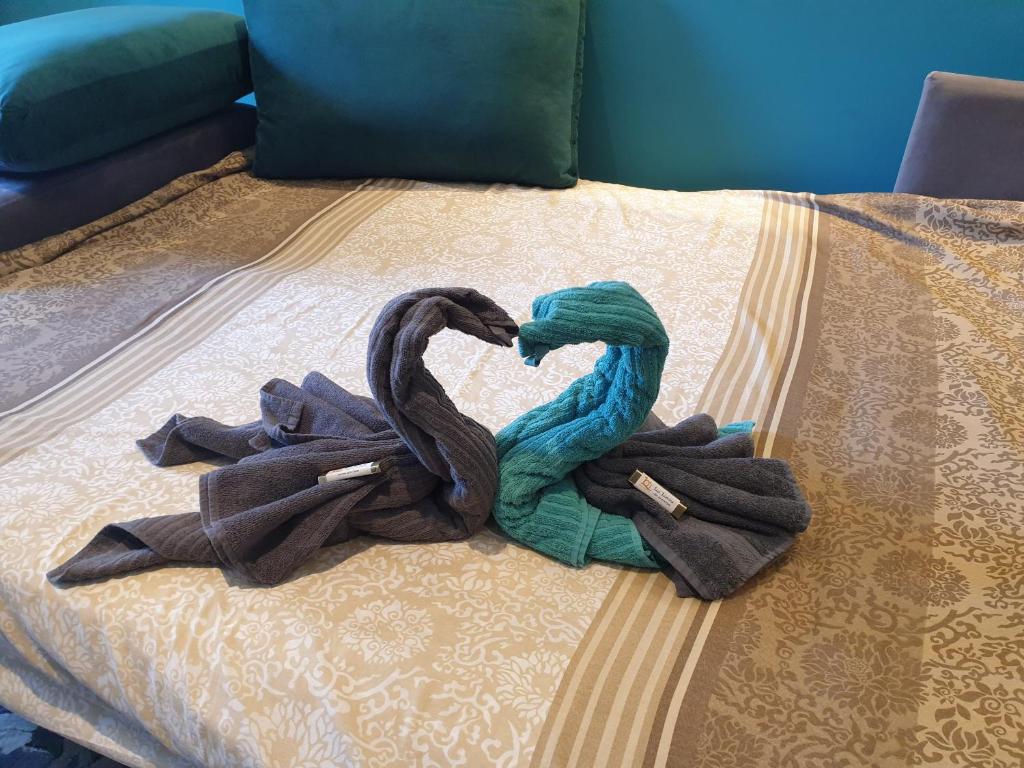 Postel nebo postele na pokoji v ubytování Lux apartman Čačak