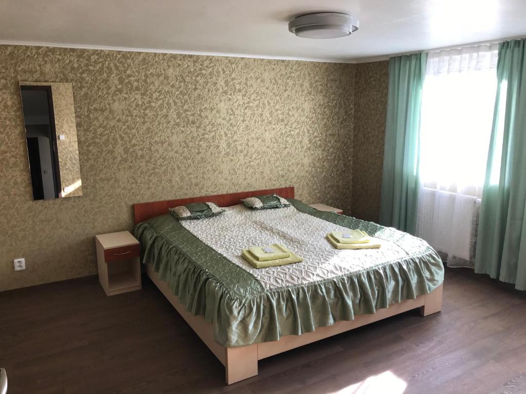 Postel nebo postele na pokoji v ubytování Penzion- Leslav