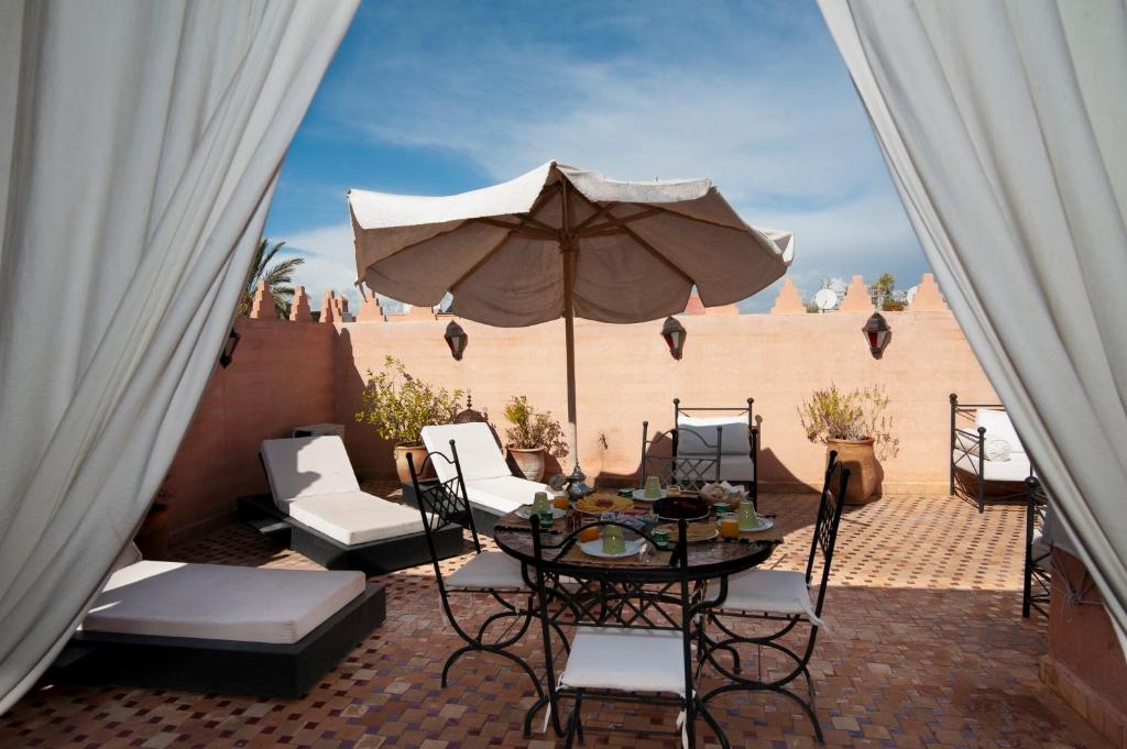 Posezení v ubytování Riad des trois palais