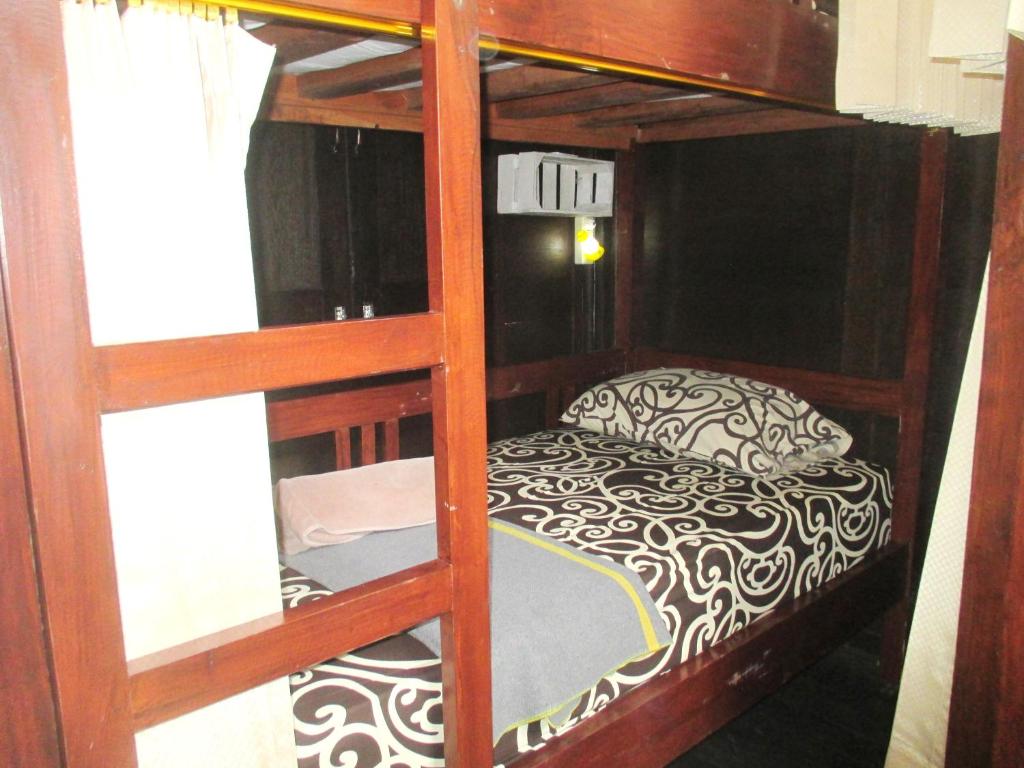 Postel nebo postele na pokoji v ubytování Green Paddy Hostel & Villa