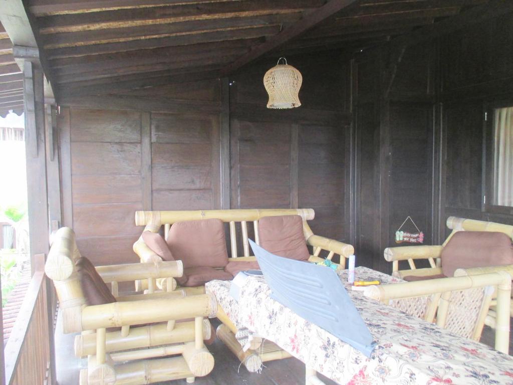 Posezení v ubytování Green Paddy Hostel & Villa