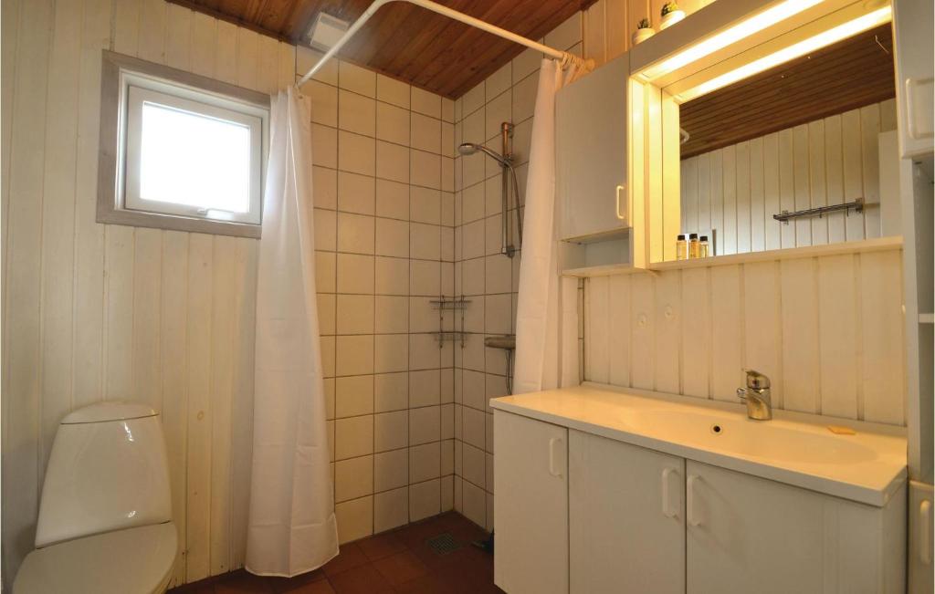 Koupelna v ubytování Holiday Home Klittoften