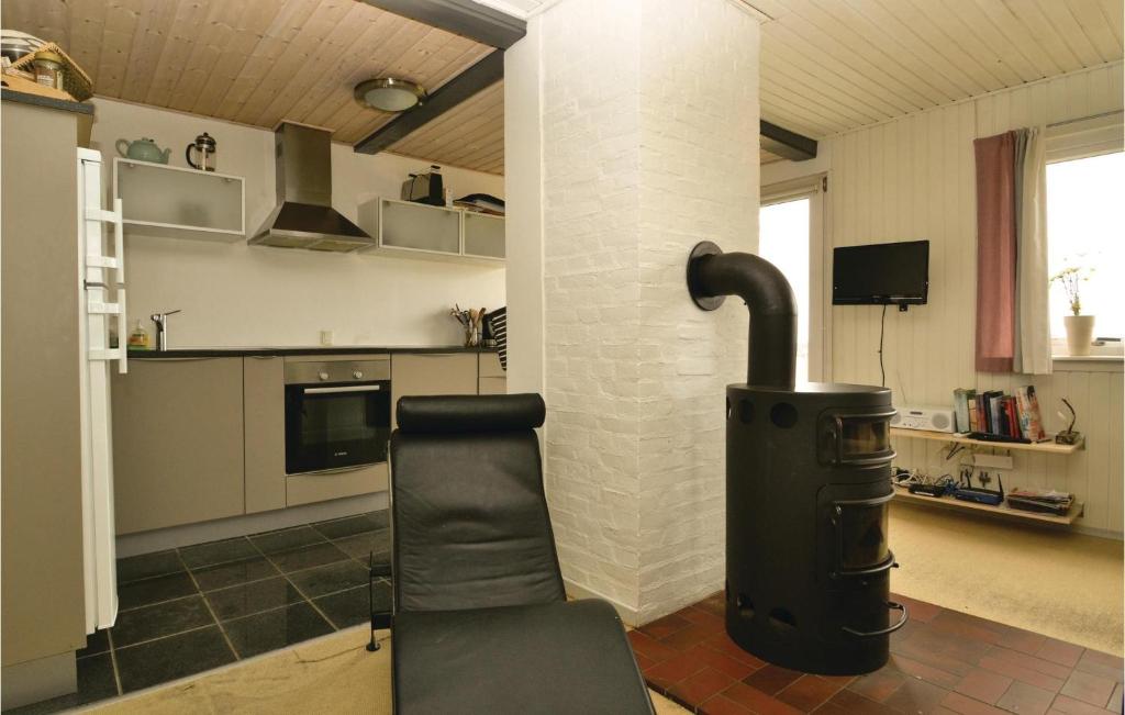 Kuchyň nebo kuchyňský kout v ubytování Holiday Home Klittoften