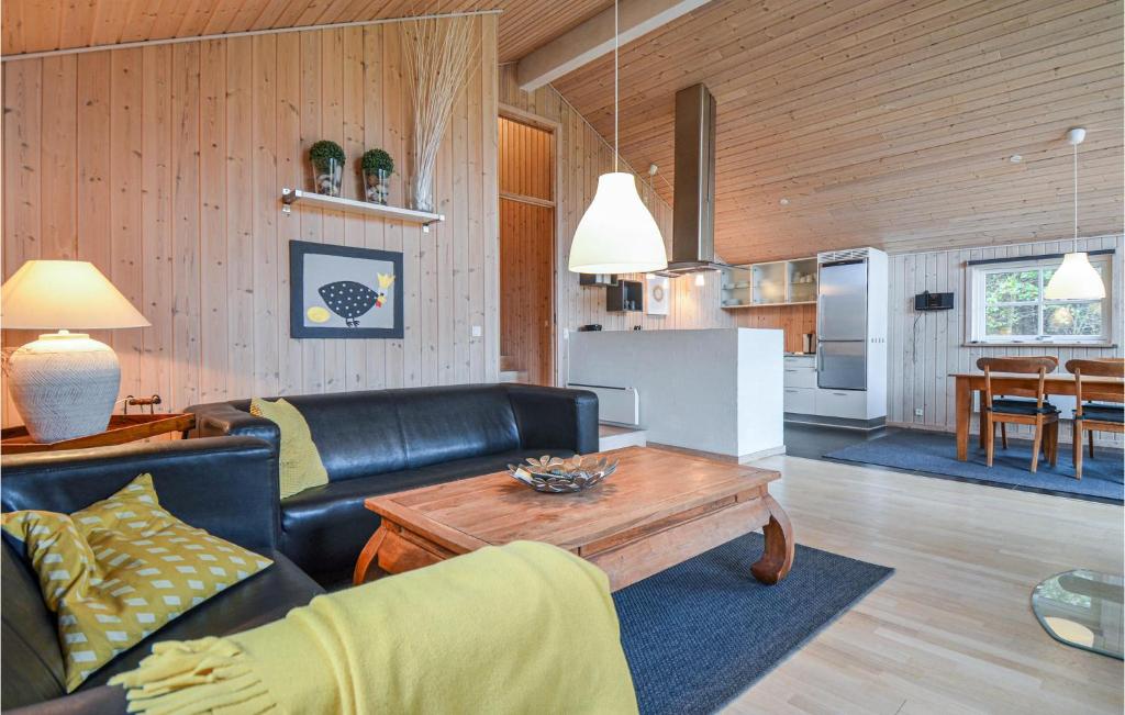 Posezení v ubytování Holiday Home Capellavej Iv
