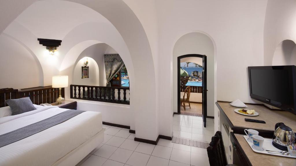 Postel nebo postele na pokoji v ubytování Arabella Azur Resort