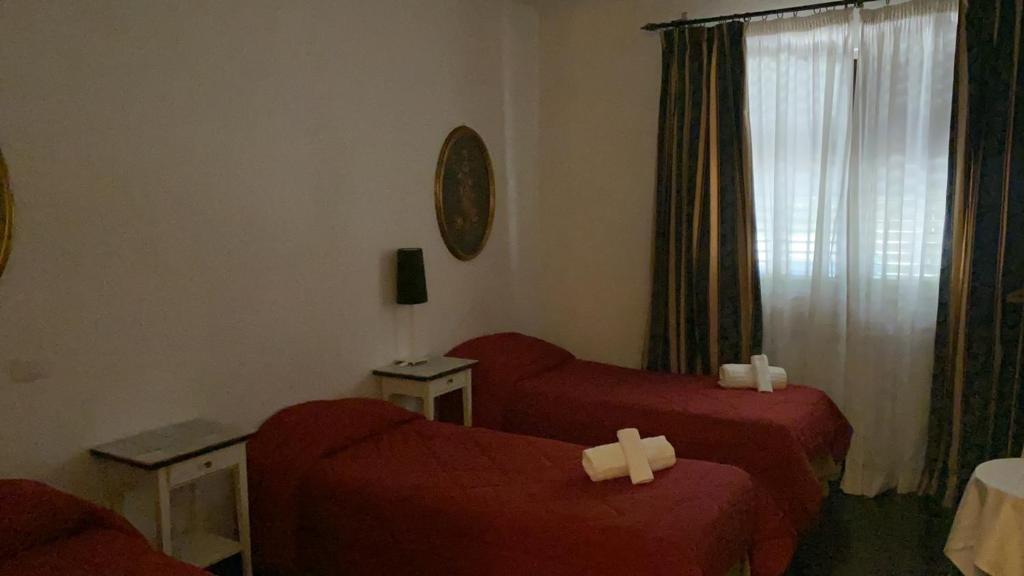Postel nebo postele na pokoji v ubytování Park Hotel Serenissima