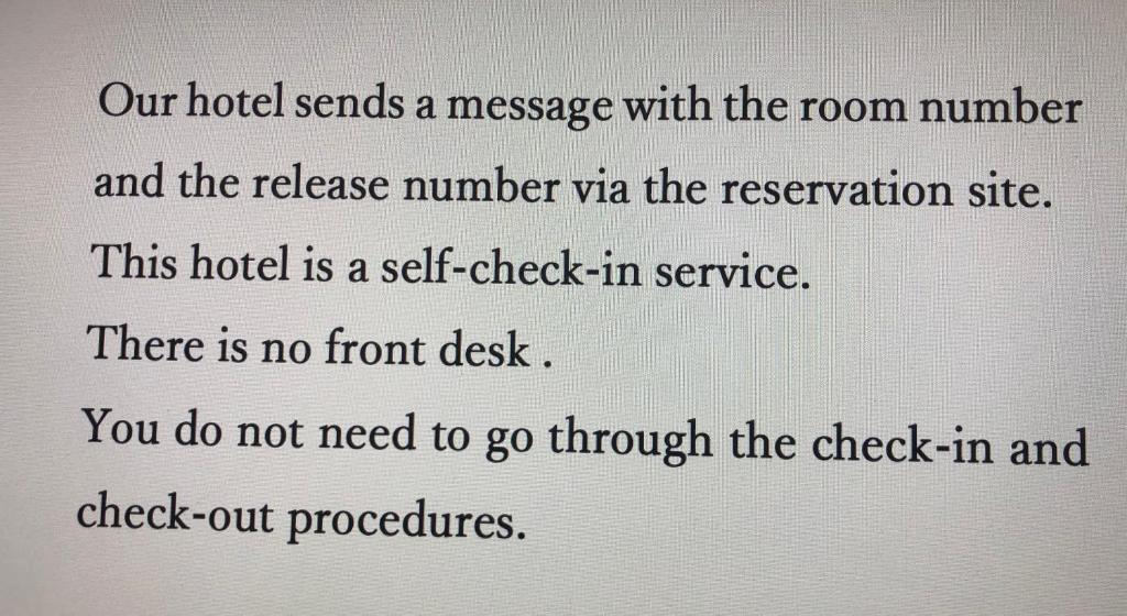 a hotel reads a message with the room number and the release number via the reservation at Oyado Zen in Kusatsu