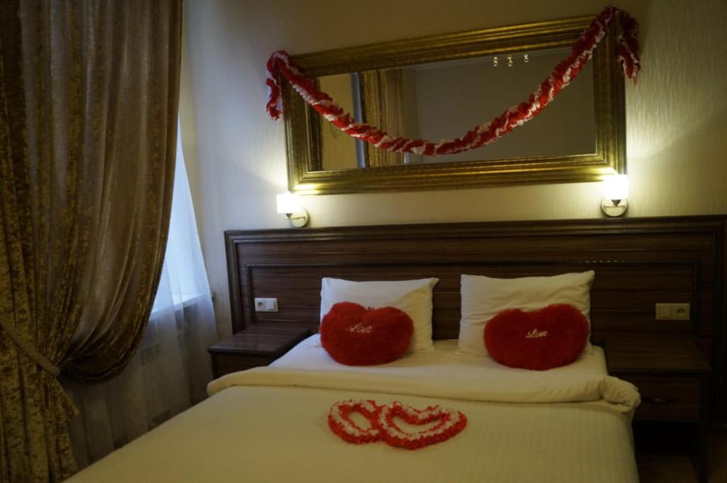 Кровать или кровати в номере Отель Рубинштейна 5