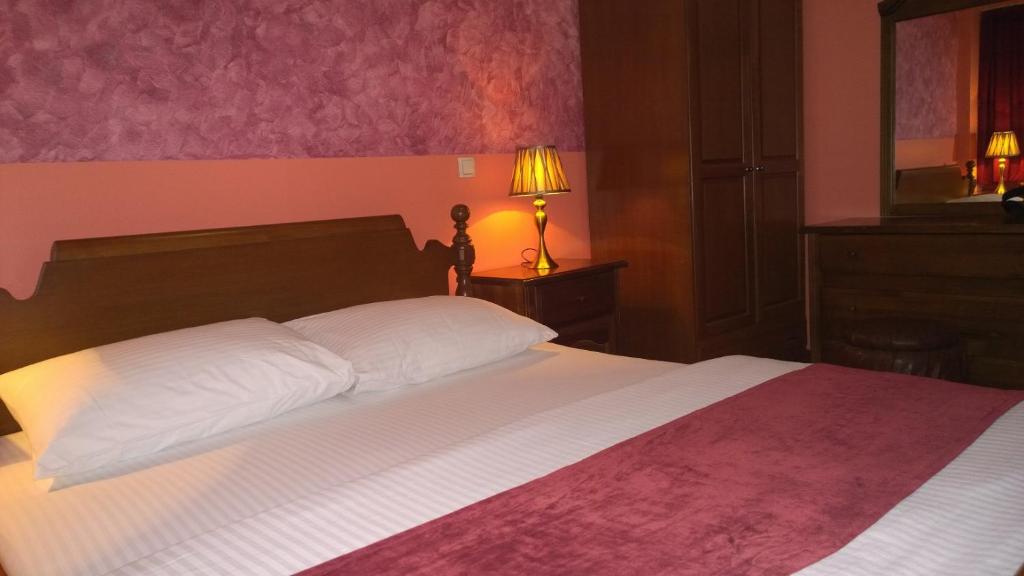 Postel nebo postele na pokoji v ubytování Hotel BM International