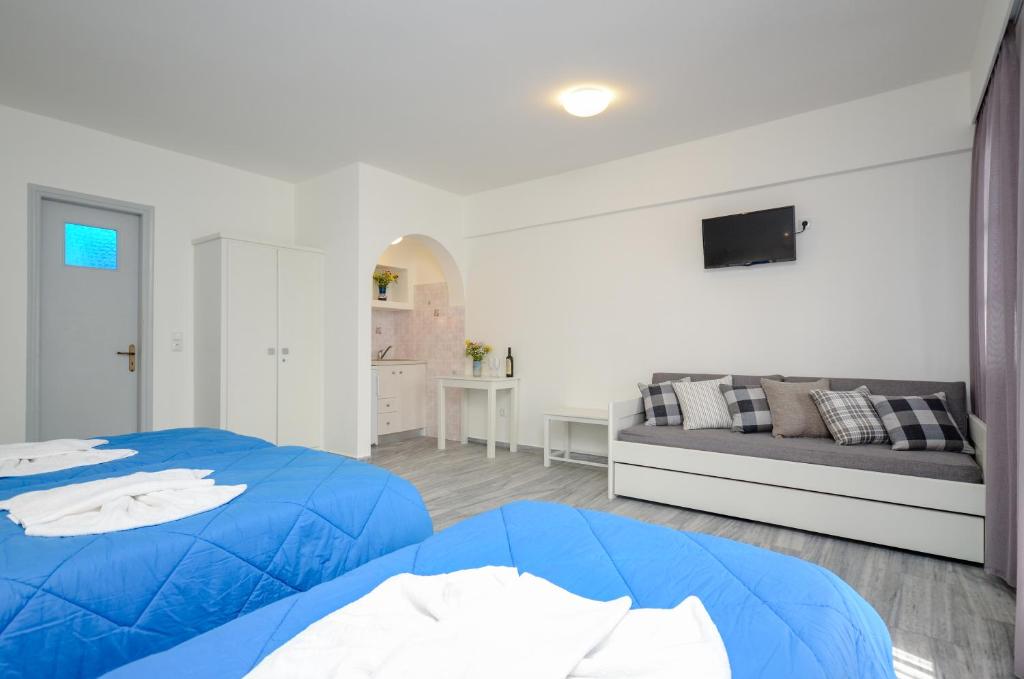 A bed or beds in a room at Soula Naxos