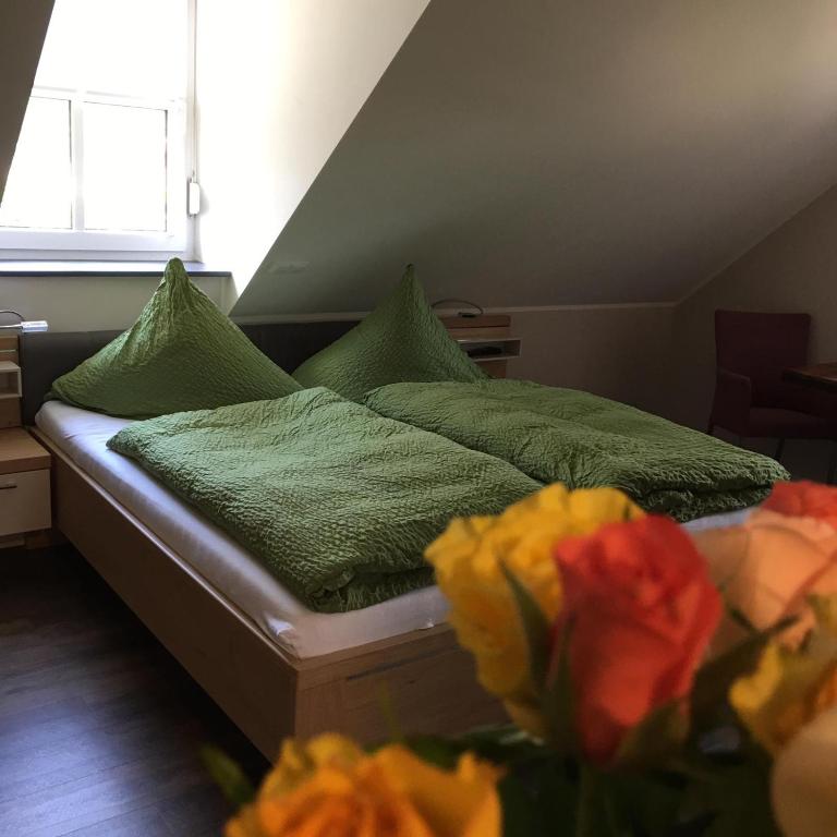 Postel nebo postele na pokoji v ubytování Haus am Parc
