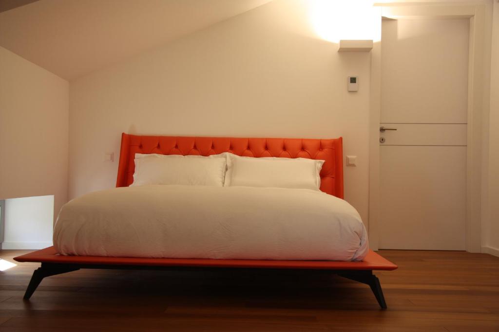 Postel nebo postele na pokoji v ubytování Al Ciani Balcony Suite