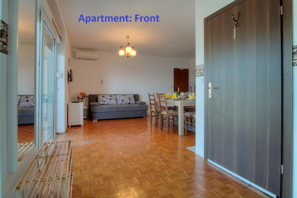 Posteľ alebo postele v izbe v ubytovaní Senj Apartment