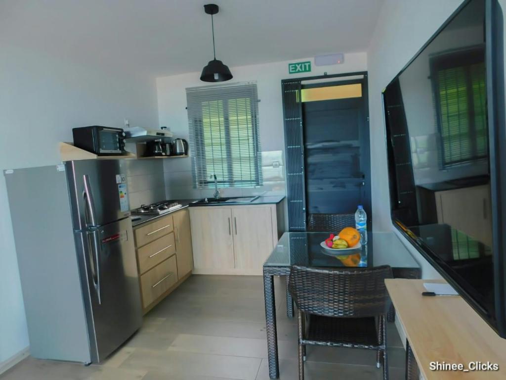 Kuchyň nebo kuchyňský kout v ubytování Fullmoon Apartment & Studio