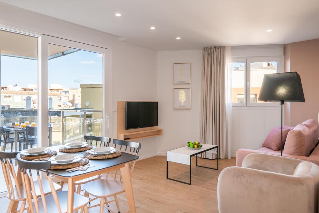 TV a/nebo společenská místnost v ubytování Ahoy Apartments