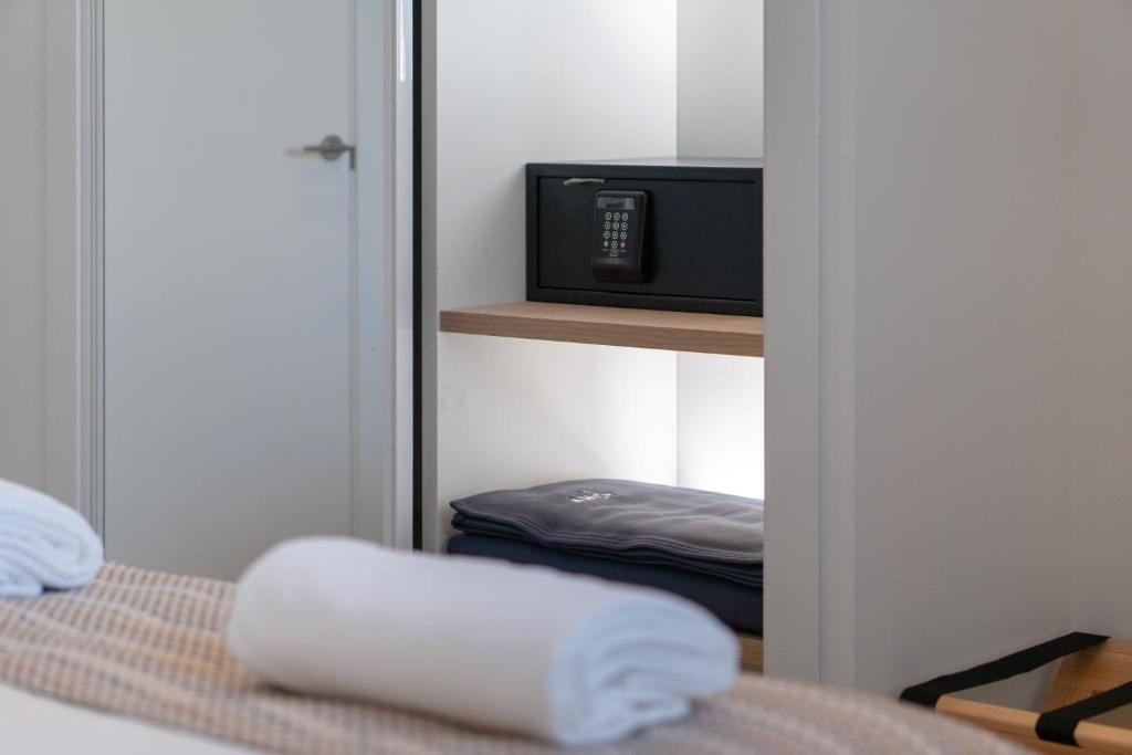 Postel nebo postele na pokoji v ubytování Ahoy Apartments