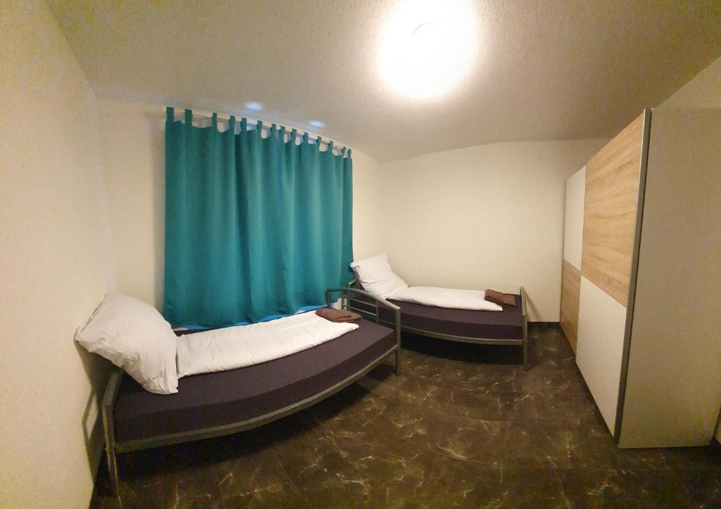 Posteľ alebo postele v izbe v ubytovaní Monteurzimmer Ferienwohnungen Fritsche-Edelfingen