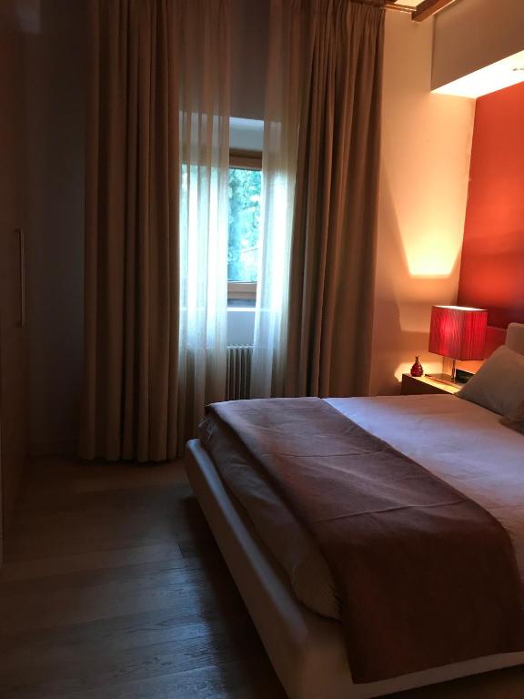 Postel nebo postele na pokoji v ubytování Appartamento in Villa con Piscina - Mhateria Relais