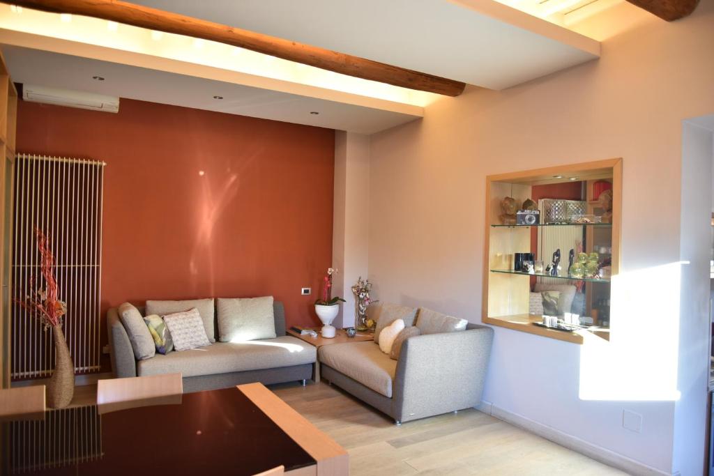 Posezení v ubytování Appartamento in Villa con Piscina - Mhateria Relais