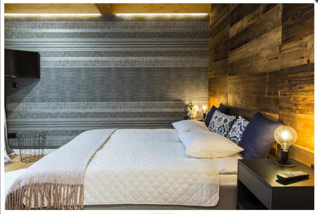 Posteľ alebo postele v izbe v ubytovaní VIP Apartamenty Gorski Relax SPA