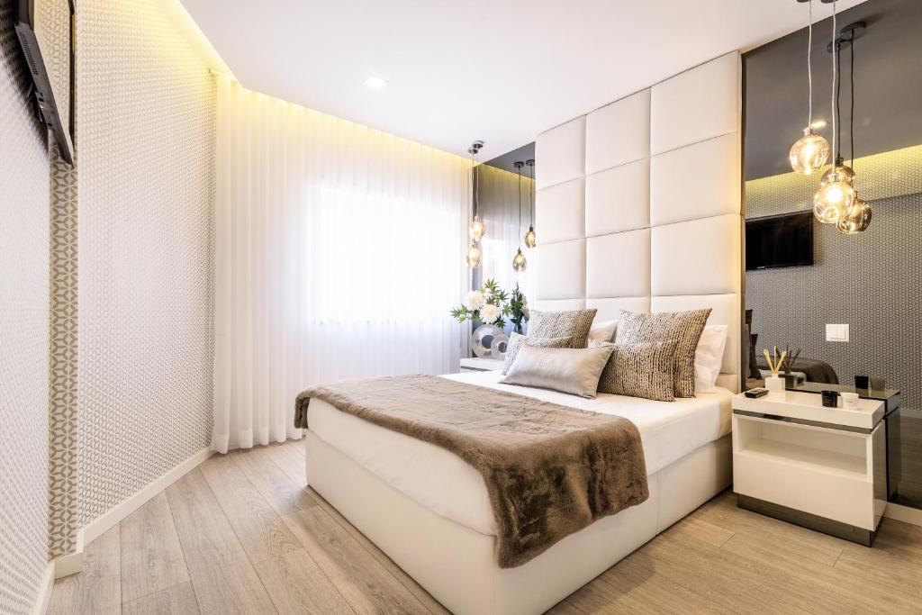 Postel nebo postele na pokoji v ubytování Cascais Center Luxury Beach Apartment