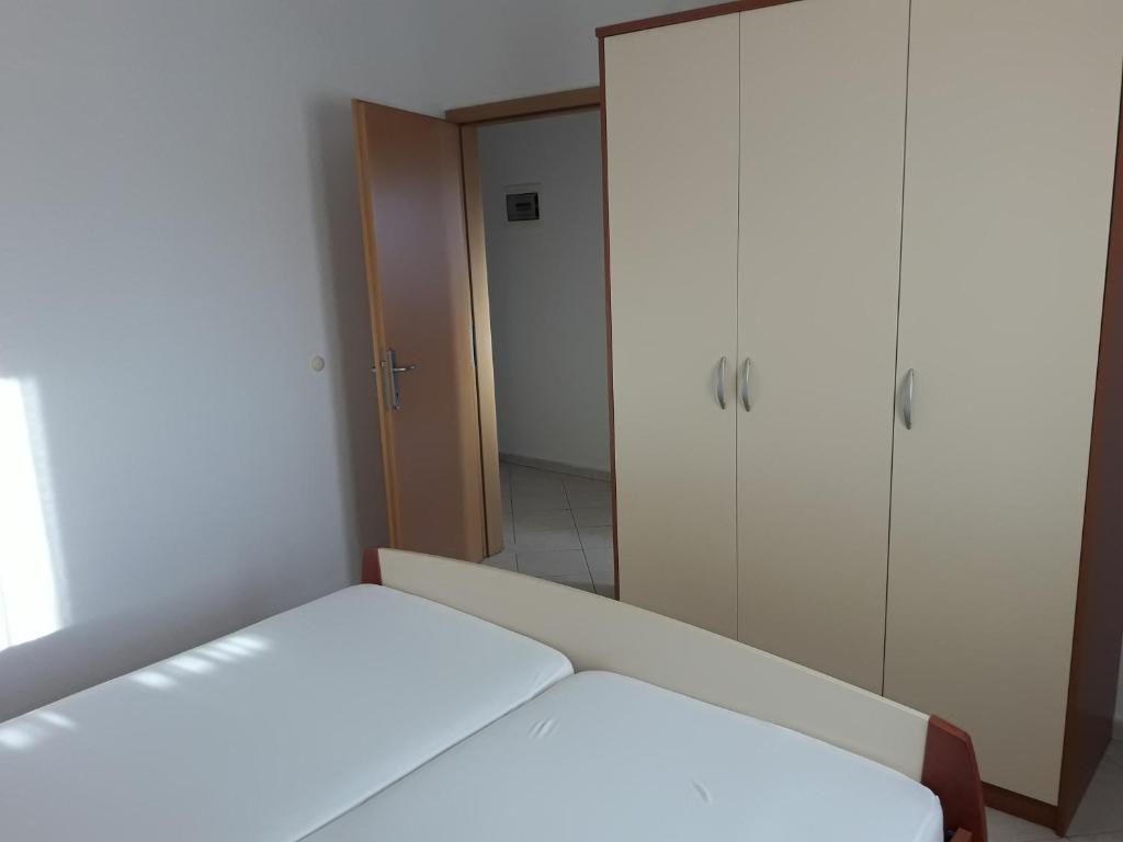 Posteľ alebo postele v izbe v ubytovaní Apartment Manuela