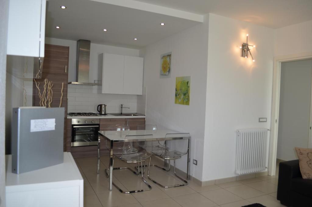 A kitchen or kitchenette at White Dream Spotorno