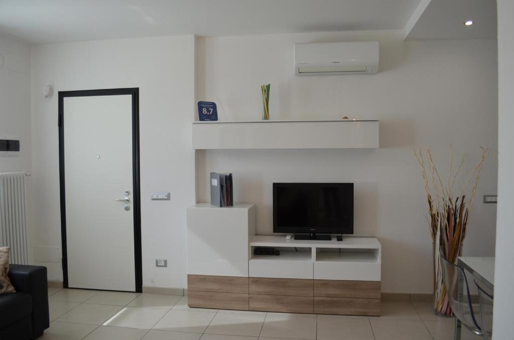 A television and/or entertainment centre at White Dream Spotorno