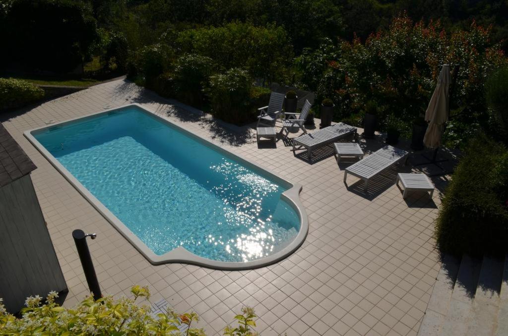 The swimming pool at or close to White Dream Spotorno