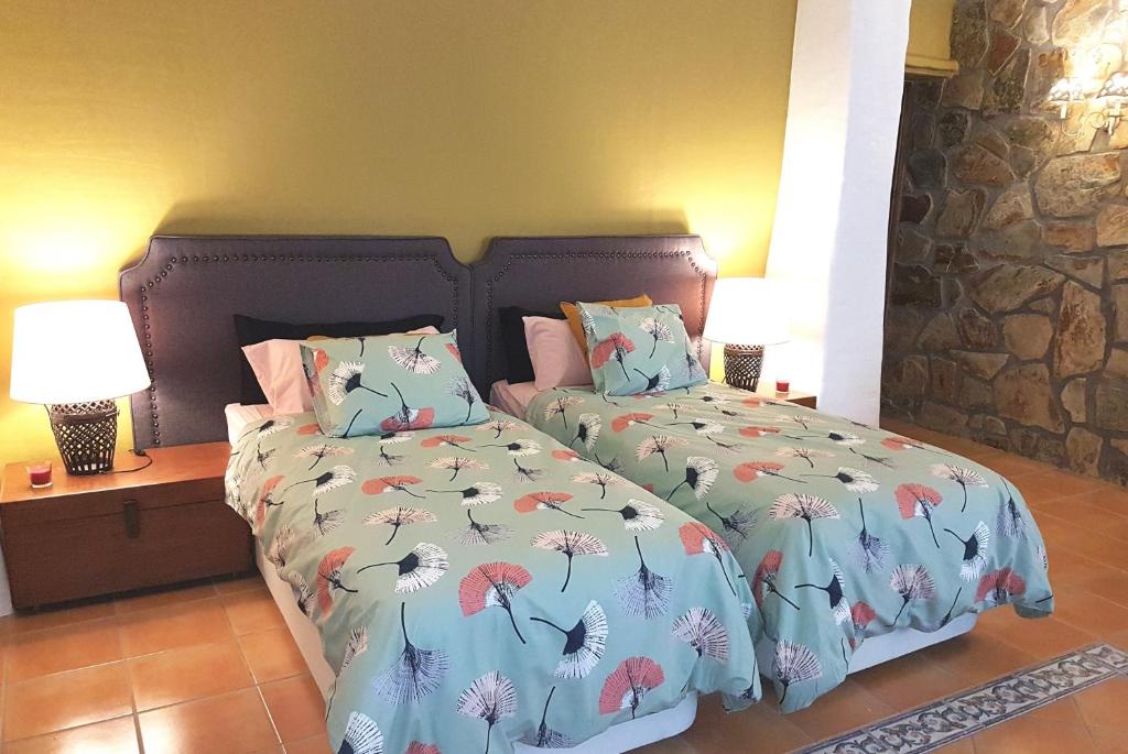 Postel nebo postele na pokoji v ubytování Competa Suites