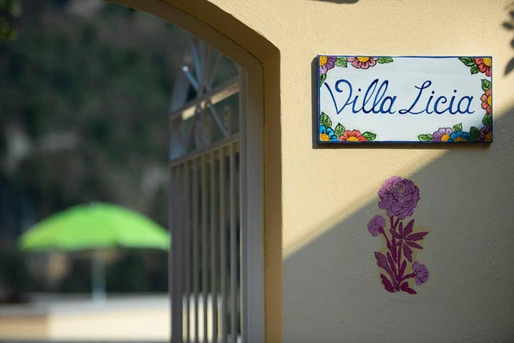 a sign that reads villilla libica on the side of a building at Casa Licia in Positano