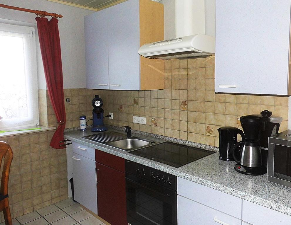 Kuchyň nebo kuchyňský kout v ubytování Haus Ramona