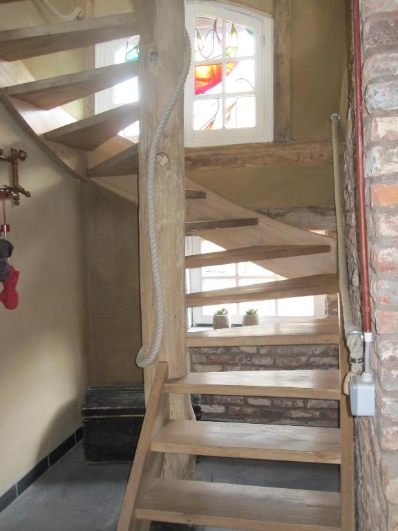 Palanda nebo palandy na pokoji v ubytování Grote Goesting holiday house