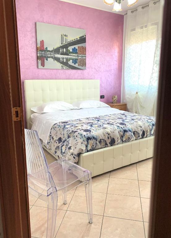 Posteľ alebo postele v izbe v ubytovaní La casa di Paola