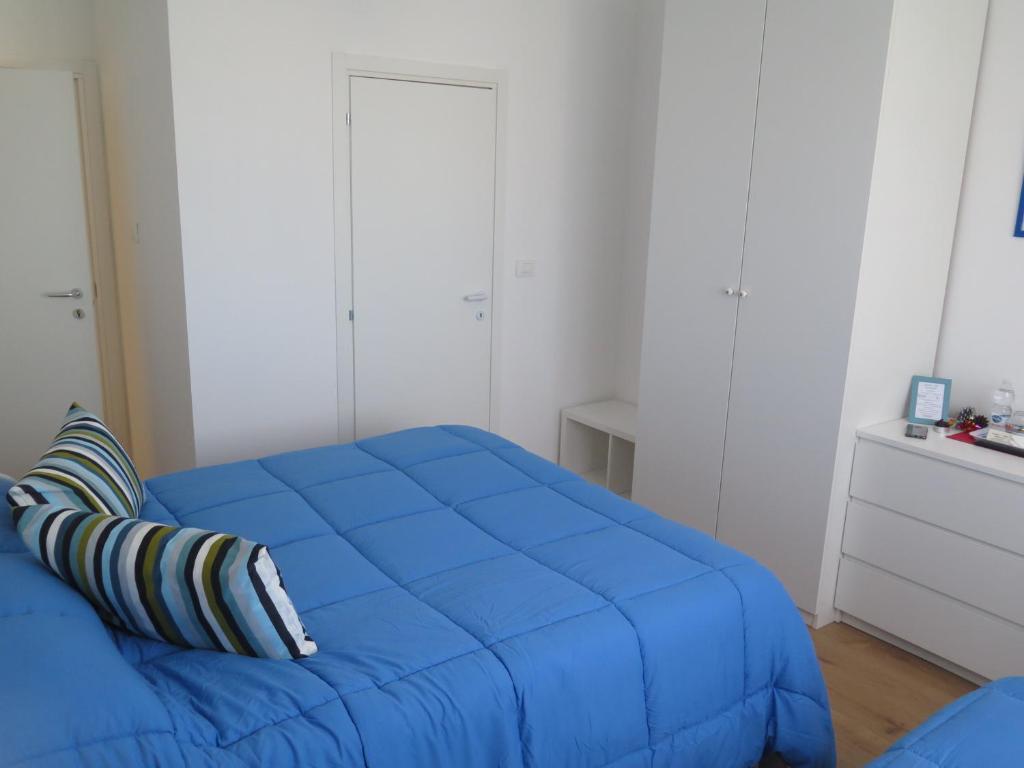 Postel nebo postele na pokoji v ubytování AnconaBed