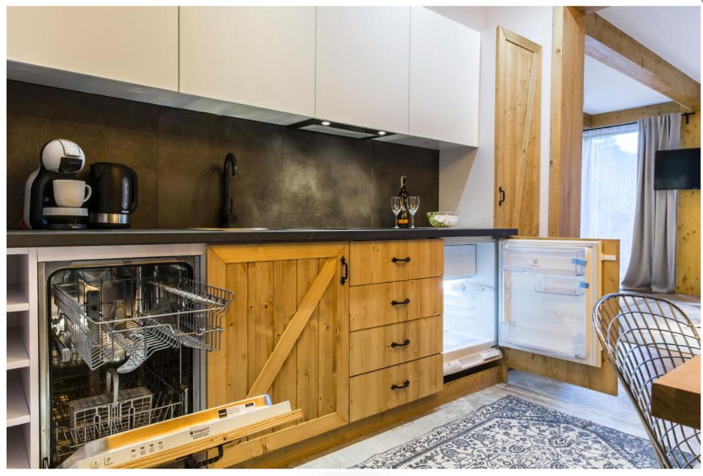 Kuchyňa alebo kuchynka v ubytovaní VIP Apartamenty Gorski Relax SPA