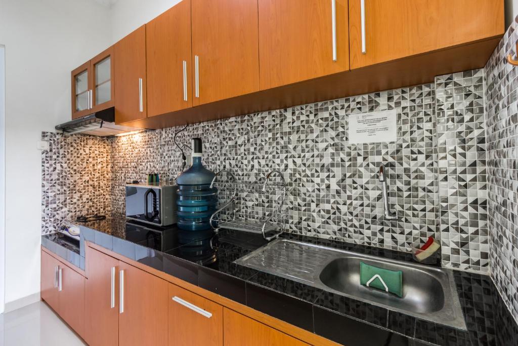Una cocina o cocineta en Omah Manis