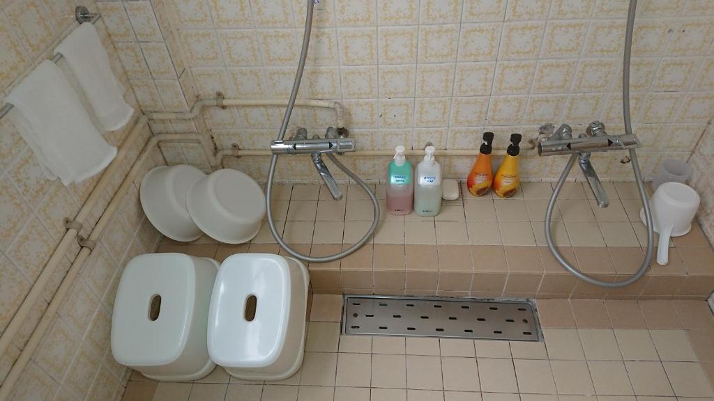 Koupelna v ubytování Kasuga Ryokan