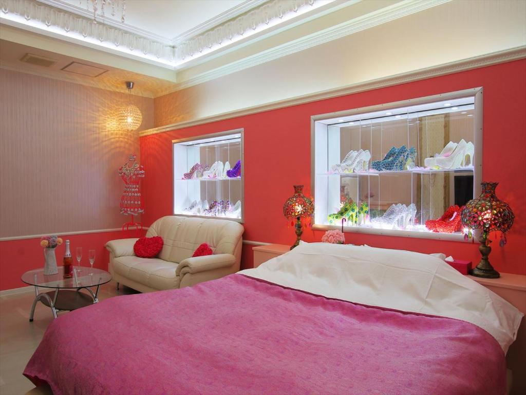 Postel nebo postele na pokoji v ubytování Hotel GIG (Adult Only)