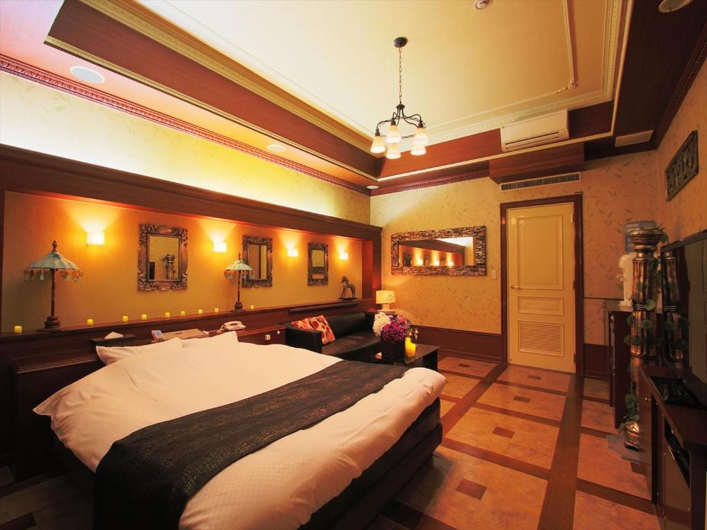 TV a/nebo společenská místnost v ubytování Hotel GIG (Adult Only)
