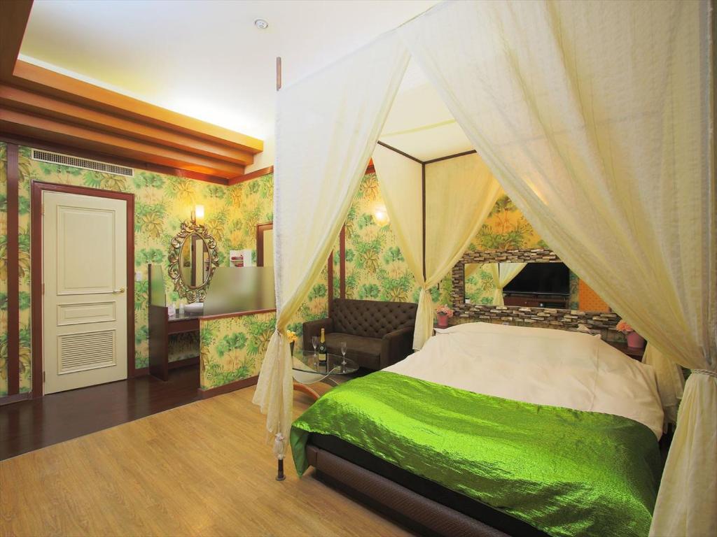 Postel nebo postele na pokoji v ubytování Hotel GIG (Adult Only)