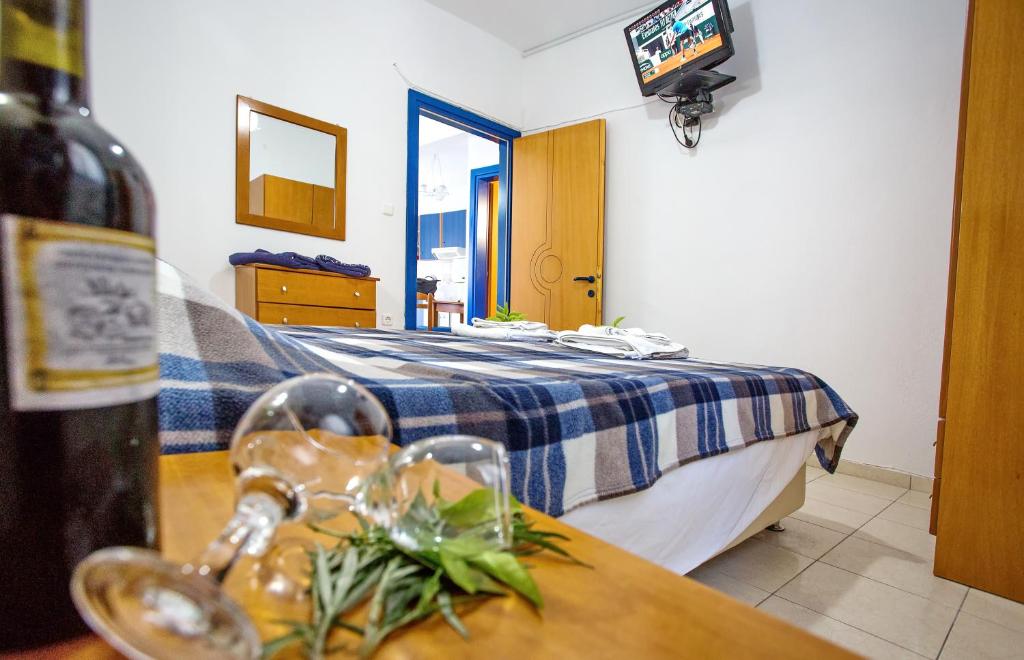 Postel nebo postele na pokoji v ubytování The Blue Beach Apartments