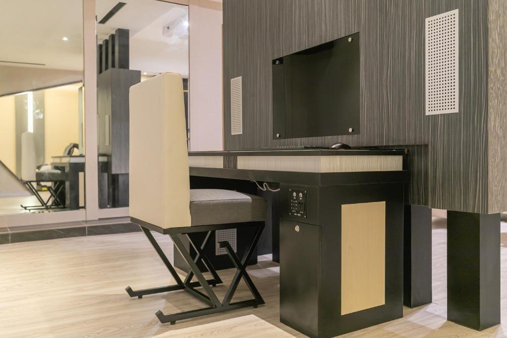 TV a/nebo společenská místnost v ubytování Soho Motel