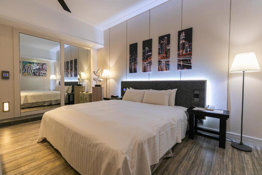 Postel nebo postele na pokoji v ubytování Soho Motel
