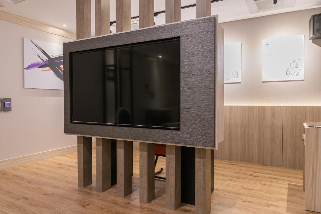 TV a/nebo společenská místnost v ubytování Soho Motel